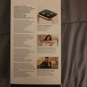 Rose Gold Fitbit Versa 2 with original packaging.